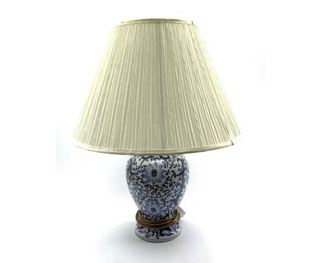 20th Century blue and white ceramic lamp with floral decoration and shade, H42cm excluding shade