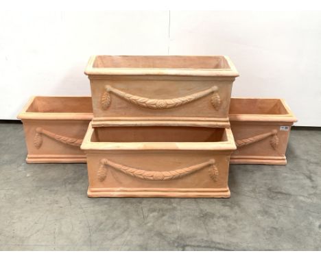 Set four trough shaped terracotta planters decorated with floral swags, W62cm Condition Report & Further Details Click here f