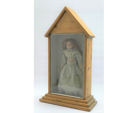 19th century wax shoulder head doll with applied hair and inset glass eyes, straw filled body with jointed limbs and kid lowe