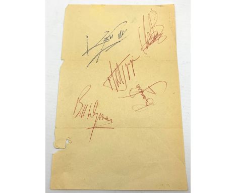 Rolling Stones full group autographs on fragment of paper with Bill Wyman, Mick Jagger, Brian Jones and Charlie Watts in red 