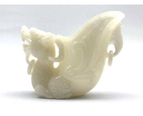 Chinese Jade style libation cup, with dog of fo and ring loop suspension handles, L18cm, H14cm Condition Report & Further Det