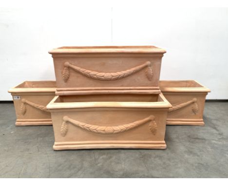 Set four trough shaped terracotta planters decorated with floral swags, W62cm Condition Report & Further Details Click here f