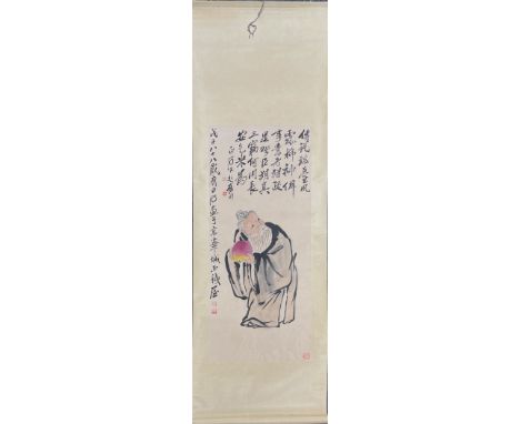 A Chinese hand painted scroll of Lao Shou Xing holding a peach , scroll size 200 x 62cm.