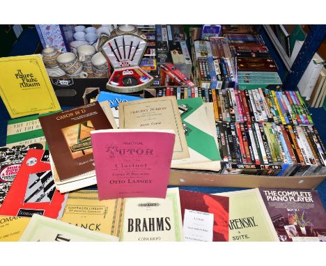 FIVE BOXES OF CERAMICS, DVDS, VHS CASETTES AND SHEET MUSIC, including a presentation tin Of Royal Boch mugs, a Staffordshire 