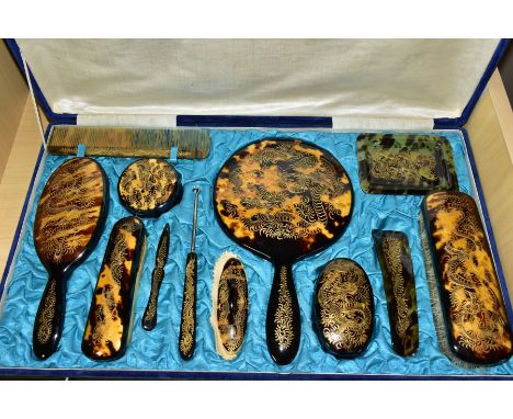 A CASED TWENTIETH CENTURY ORIENTAL VANITY DRESSING TABLE SET, twelve pieces including mirror, clothes and hair brushes, comb,