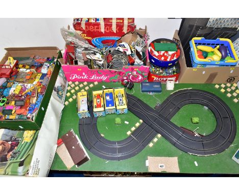 A QUANTITY OF ASSORTED TOYS AND GAMES, SCALEXTRIC, ETC, including a mounted figure of eight race track lay out, overall lengt