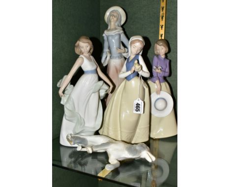 THREE NAO FGURES OF GIRLS AND A TENGRA SPANISH PORCELAIN FIGURE GROUP, comprising two Nao figures of girls holding small bird