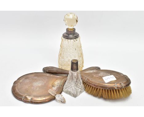 A SILVER VANITY HAIR BRUSH AND MIRROR WITH TWO SILVER MOUNTED SCENT BOTTLES, the hair brush of a plain polished design with w