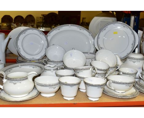 A SEVENTY PIECE ROYAL DOULTON YORK H5100 DINNER SERVICE, comprising a meat plate, an oval dish, a sauceboat and stand, a teap