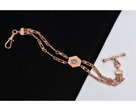 A 9CT ROSE GOLD ALBERTINA, textured hexagonal centre set with an oval cut blue topaz collet mounted, fitted either side are d
