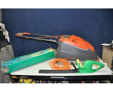 A FLYMO VISION COMPACT 380 LAWN MOWER and a NuTool Hedge Trimmer (both PAT pass and working)