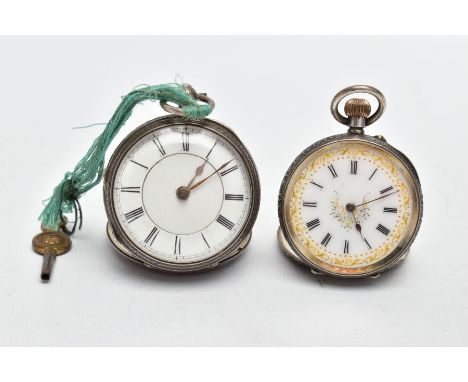 TWO SILVER POCKET WATCHES, the first an open face watch with a round white dial, Roman numerals, gold tone hands, within a fl