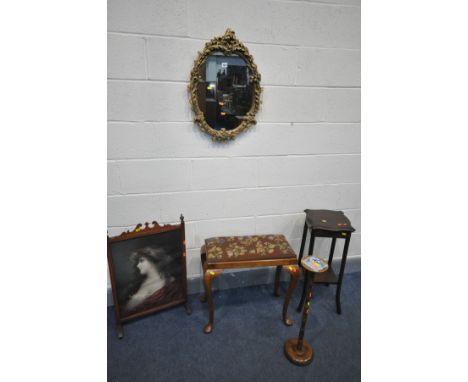 A WALNUT DRESSING STOOL, with needlework drop in seat pad, on cabriole legs, along with an oak plant stand, foliate framed wa