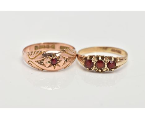 TWO 9CT GOLD GARNET RINGS, the first an early 20th century ring, with a star set circular cut garnet, flanked with a diamond 