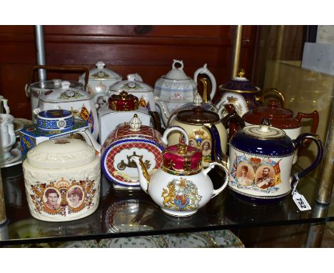 A GROUP OF ROYAL COMMEMORATIVE TEAPOTS, TEA CADDIES AND BISCUIT BARRELS, mainly twentieth century to include eight teapots, t