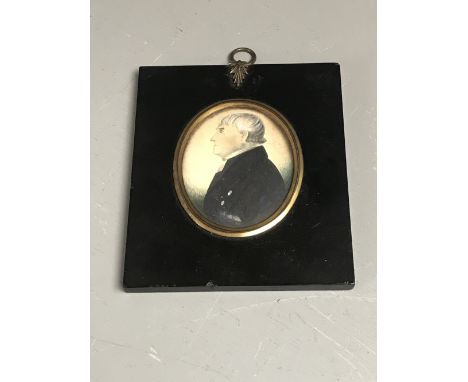 Oval portrait miniature of Gentleman in C18th dress, with grey hair, in black rectangular frame; oval is 8 x 6cm 