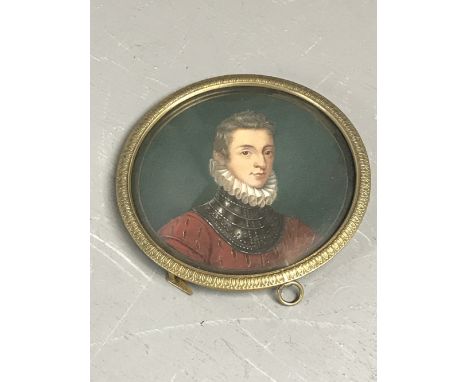Portrait miniature of period Gentleman in ruff collar, and set in brass circular frame, 9 cm diameter 