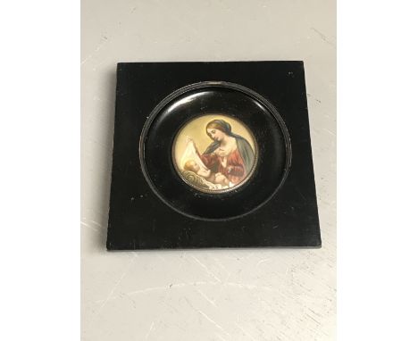 Portrait miniature of a Madonna and child religious scene, in brass circular frame 5cm diameter, and set in square black wood