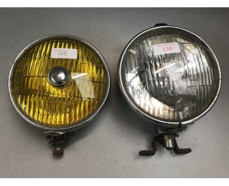 A Lucas sealed beam car spotlight, A Miller car fog light with yellow lens both dating from the 1960's 