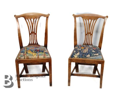Set of four dining chairs, in the Chippendale manner, 19th century, raised on straight legs and stretchers, having varied emb