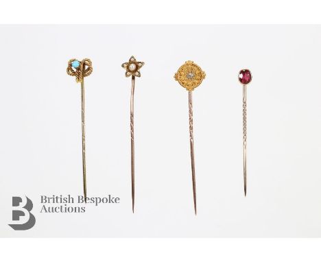 Quantity of tie pins, including a 15ct turquoise tie pin, 9ct gold and pearl tie pin and a 9ct and ruby tie, 4.9 gms.&nbsp;