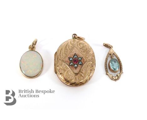 9ct yellow gold and opal locket, London hallmark, dated 1981. The opal measures 14 x 11mm, a 9ct gold and aquamarine pendant 