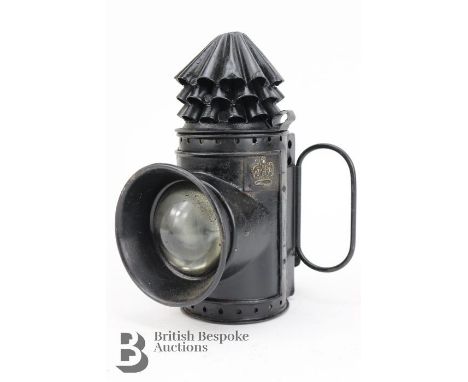 A Victorian London policeman's black Japan oil powered hand lamp with bulls eye lens, by Hiatt & Company of Birmingham, suppl