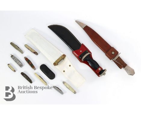 Two Bowie knives, including a Dalian bowie knife, 24 cms blade, wood hilt with a horse-serpent on the pommel, housed in a lea