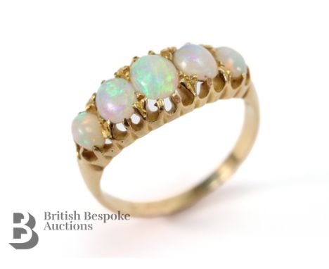 Edwardian yellow gold five stone opal ring, Birmingham hallmark dated 1902. The opals measure two 6 x 4mm and two 4 x 2mm, si