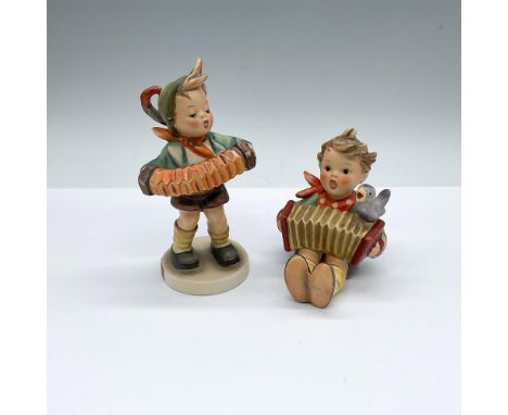 Hand painted and hand made porcelain German figures of boys playing the accordion. Goebel backstamps. Accordion Boy: HUM 185;