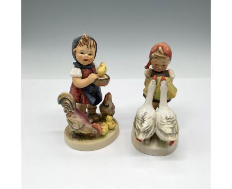 Hand painted, matte finished figures of little girls with animals. Lot includes Goose Girl 47 and Feeding Time 199. Goebel Hu