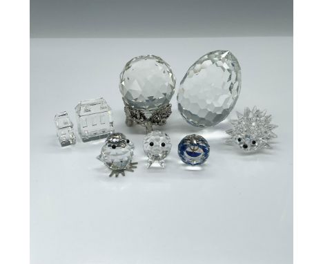 This brilliant crystal grouping includes six Swarovski pieces: a little chick, small hedgehog, two houses, a small pig, and a