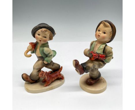 Hand painted figures walking along with his umbrella. Lot includes Globe Trotter 79 and Strolling Along 5. Goebel Hummel back
