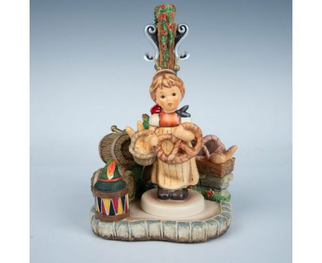 Hand painted and hand made figure of a little girl with a giant pretzel, and Hummelscapes exclusively for Busch Gardens. Goeb