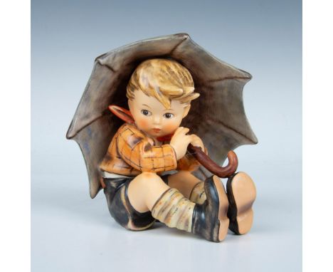 Hand-painted in matte finish modeled as a young boy seated holding his umbrella. Goebel backstamp TMK6. Artist signed. Issued