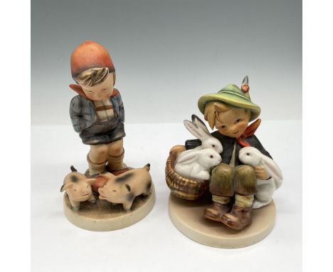 Hand painted figures with bunnies and pigs. Lot includes Playmates 58 and Farm Boy with Pigs 66. Goebel Hummel backstamp. Lar