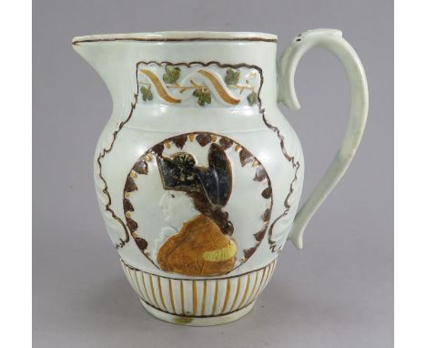 A late eighteenth century commemorative prattware pearlware jug, c. 1795. One side has a moulded and painted portrait of the 