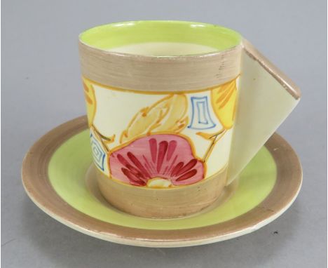 An early twentieth century Art Deco Newport Pottery Clarice Cliff Fantasque conical shape coffee can and saucer, c. 1930. It 