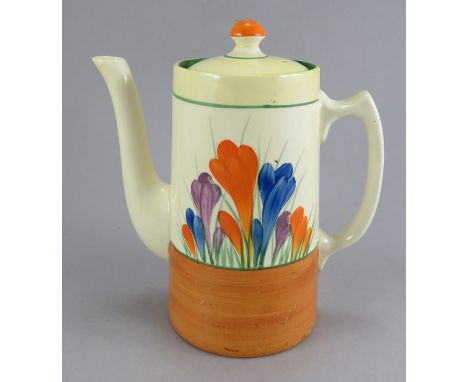 An early twentieth century Art Deco Newport Pottery Clarice Cliff Crocus pattern lidded coffeepot, c. 1930. It is hand-painte