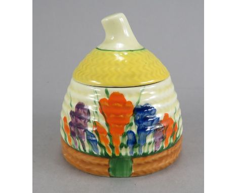 An early twentieth century Art Deco Wilkinson Pottery Clarice Cliff Crocus pattern lidded honey pot, c. 1930. It is hand-pain