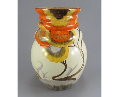 An early twentieth century Art Deco Wilkinson Clarice Cliff shaped Rhodanthe vase, c. 1934. It is hand-painted with flowers a
