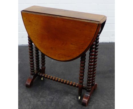 Small mahogany drop leaf table, on bobbin supports and ceramic castors,  60 x 55cm 