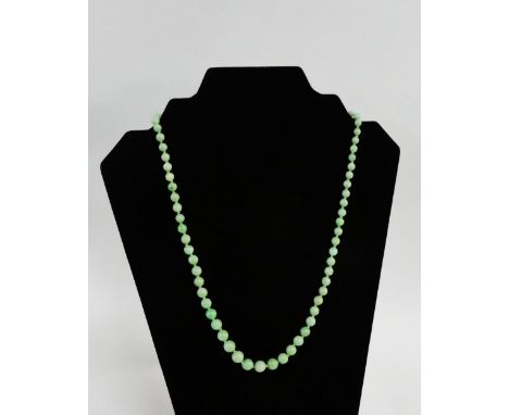A vintage strand of graduating jade beads