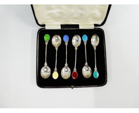 Early 20th century cased set of six silver and coloured enamel coffee spoons, stamped silver (6) 