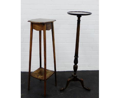 Mahogany torchere stand on a baluster column and tripod legs together with an oak two-tier plant stand, 106 x 32cm (2) 