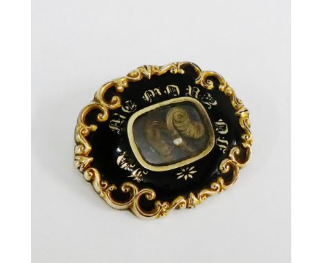 Victorian gold and black enamel mourning brooch with glazed locket panel, inscribed verso 'Edward Brown, my husband who died 