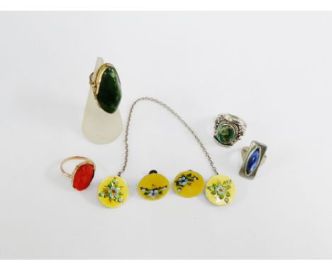 A mixed lot to include three rings, enamel earrings and a pewter ring (6) 