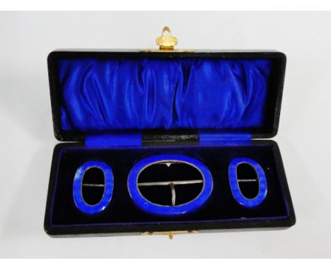 George V set of three silver and blue guilloche enamel buckles, in a fitted case with makers mark for Adie &amp; Lovekin Ltd,