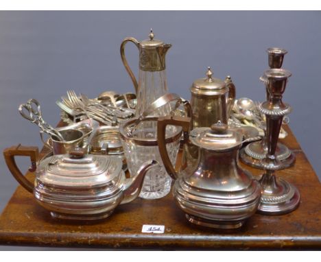 A large quantity of silver plate including teapot, coffee pot, dishes, cutlery and pair candlesticks 