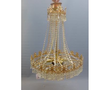 An 8 light glass pendent chandelier